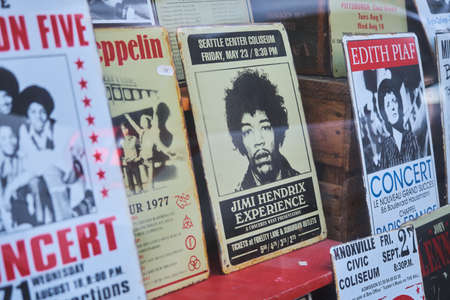 Paris, France - November 12, 2020: metalic concert poster of Jimi Hendrix behind a window shopのeditorial素材