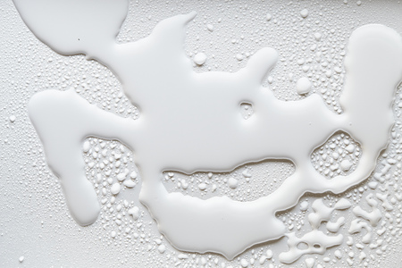 milk splash drops white moodの写真素材