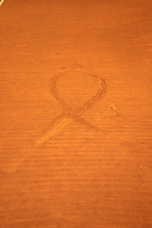 stripe an footprints on red sand courtsの写真素材