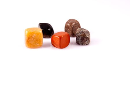 Isolated aligned stones on a white background