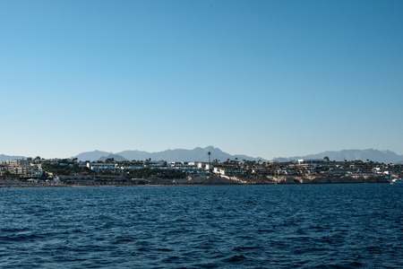 view on mountains and tropical palmsの写真素材