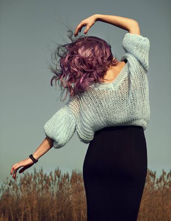 Girl traveler posing on nature background at vocationの写真素材