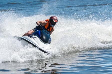 Man on wave runner - extreme water sport Man on wave runner - extreme water sport