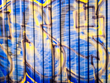 Abstract graffiti texture on a wallの素材