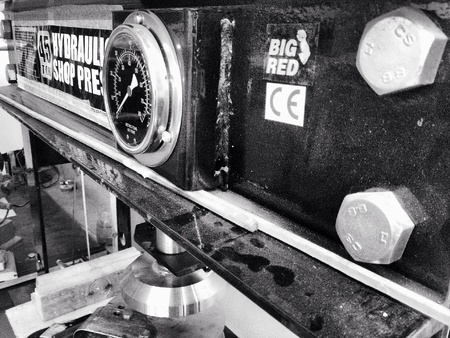 Hydraulic press in metal workshop