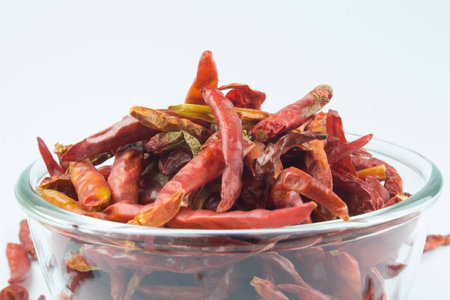 Dried red chilli peppers in a bowl
