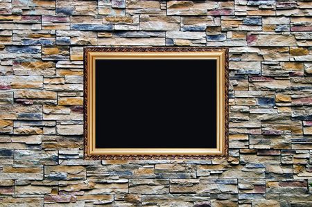 the bright and nice artifical ornamental stone wall with old russian style wooden photo frame with stucco moulding の写真素材