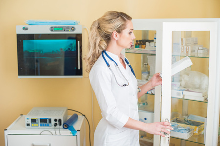 Young woman gynecologist . Beautiful female doctor in hospital. Medical officeの写真素材