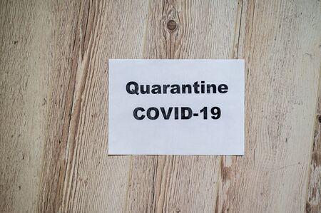 The inscription on a piece of paper Quarantine. Pandemic covid-19. Stay at home.の写真素材