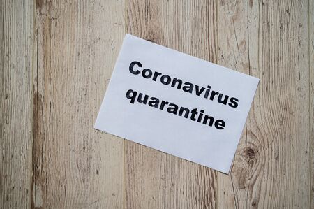 The inscription on a piece of paper quarantine coronavirus. Deadly virus announcement.の写真素材