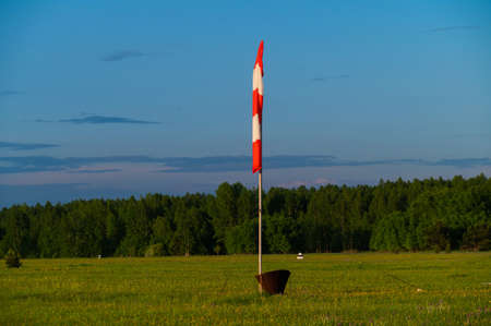Windsock at the airfield during calm weather