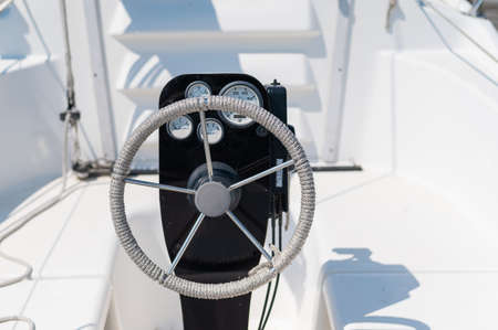 Close-up of a yacht steering wheel.の写真素材