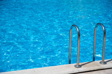 Outdoor pool railings with clear water