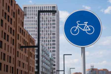 Bicycle path road sign on city streetの写真素材