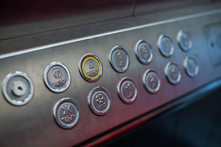 Buttons in the elevator with Braille code for blind peopleの写真素材