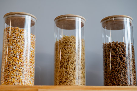 Glass jars with cereals in an eco friendly store. The concept of a grocery store without plastic disposable packagingの写真素材