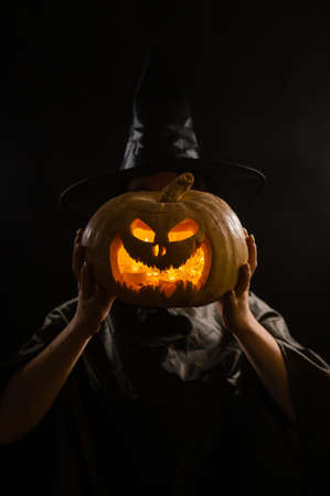 Pumpkin jack o lantern instead of a womans head. Halloweenの写真素材