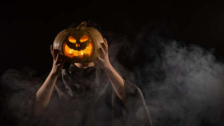 Pumpkin jack o lantern instead of a womans head. Halloween