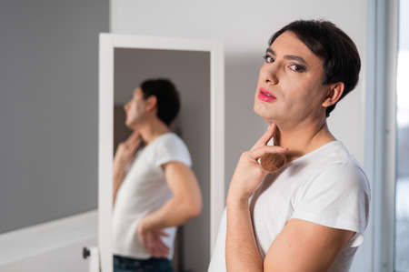 Homosexual man with bright makeup. Male transgender.の写真素材