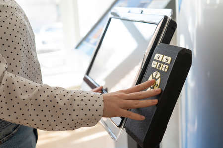 A woman uses a voting device for blind and visually impaired citizens.