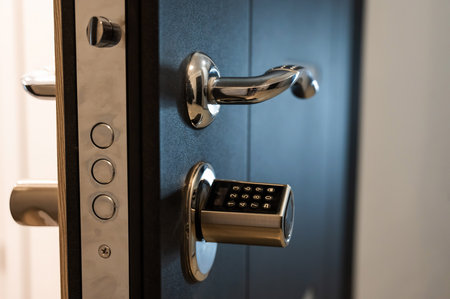 Open door to the apartment with a combination lock. Keyless entry.の写真素材