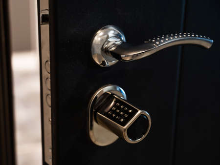Open door to the apartment with a combination lock. Keyless entry.