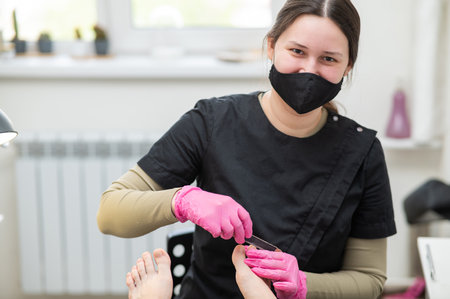 The master makes hardware pedicures to the client.