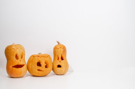 Three jack-o-lantern on a white background. Halloween decoration.の写真素材
