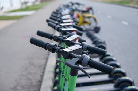 05.02.2022 Sochi, Russia: Row of electric scooters for rent outdoors.のeditorial素材
