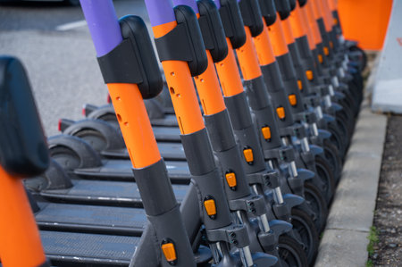 05.02.2022 Sochi, Russia: Row of electric scooters for rent outdoors.のeditorial素材