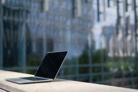 Open laptop outdoors in downtown. Nobody.の写真素材