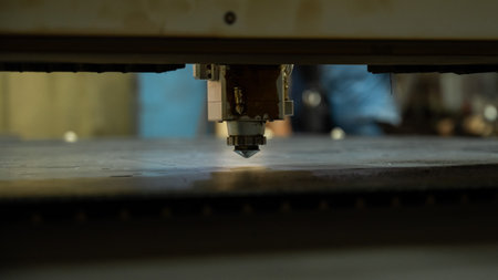 CNC machine. Laser cutting of metal. Sparks.の写真素材