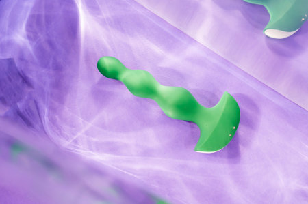 Green beads in highlights on purple backgroundの写真素材