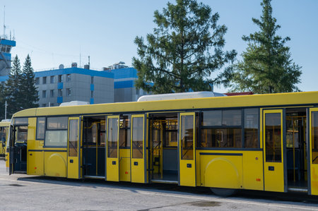 Bus with open doors at the airportの写真素材