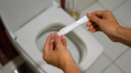 A woman takes an express pregnancy test