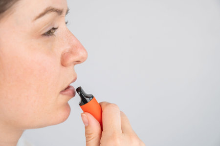 Caucasian woman smoking disposable vape