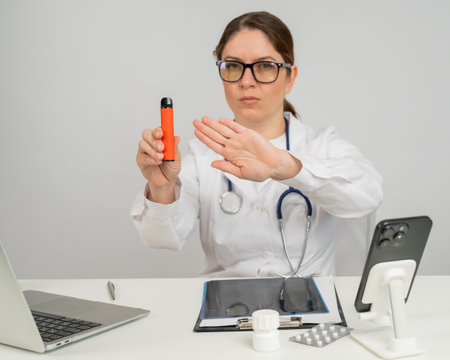 Doctor warns about dangers of smoking disposable vapesの写真素材