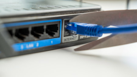 Scissors cut the router cablesの写真素材