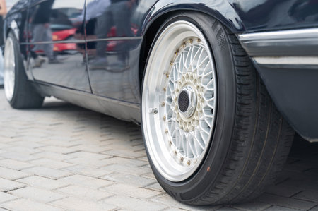 Close-Up of Custom Car Wheel and Tire Excellenceの写真素材