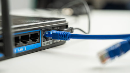 The internet cable is plugged into the router