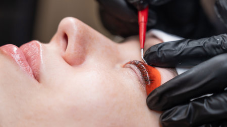 Caucasian woman undergoing eyelash lamination procedureの写真素材