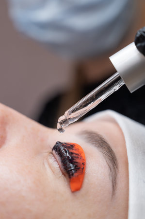 The process of professional lamination and tinting of eyelashes in the salon