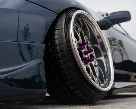 Close-Up of Custom Car Wheel and Tire Excellenceの写真素材