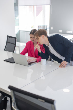 woman giving instructions to subordinate