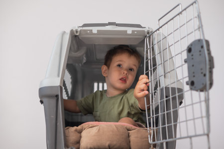 A small child in a closed cageの写真素材