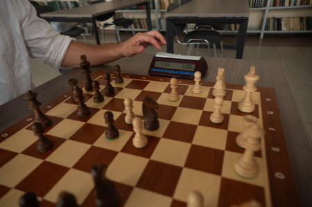 A man switches a chess clockの写真素材