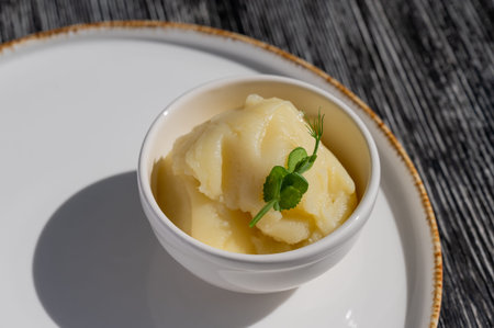 A plate of mashed potatoes in a cafe