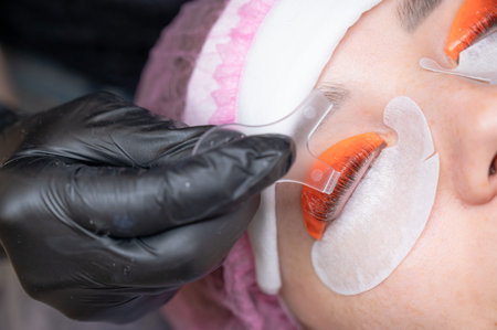 Caucasian woman undergoing eyelash lamination procedure