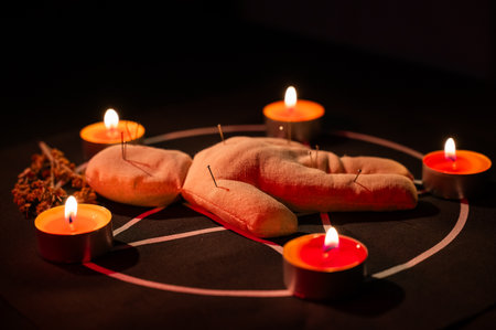 Voodoo doll on a pentagram. Witch spellsの写真素材