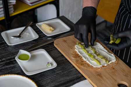 The cook prepares a fruit roll.の写真素材